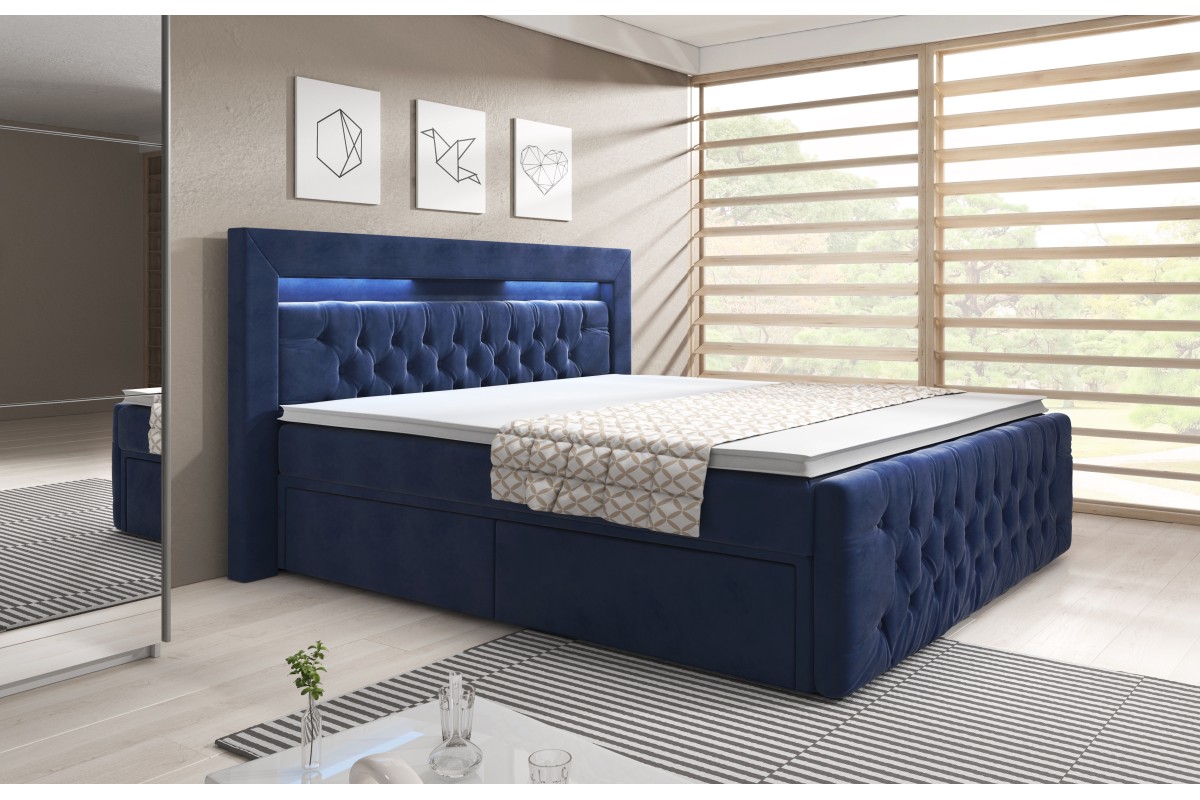 Granatowe łóżko kontynentalne z szufladami